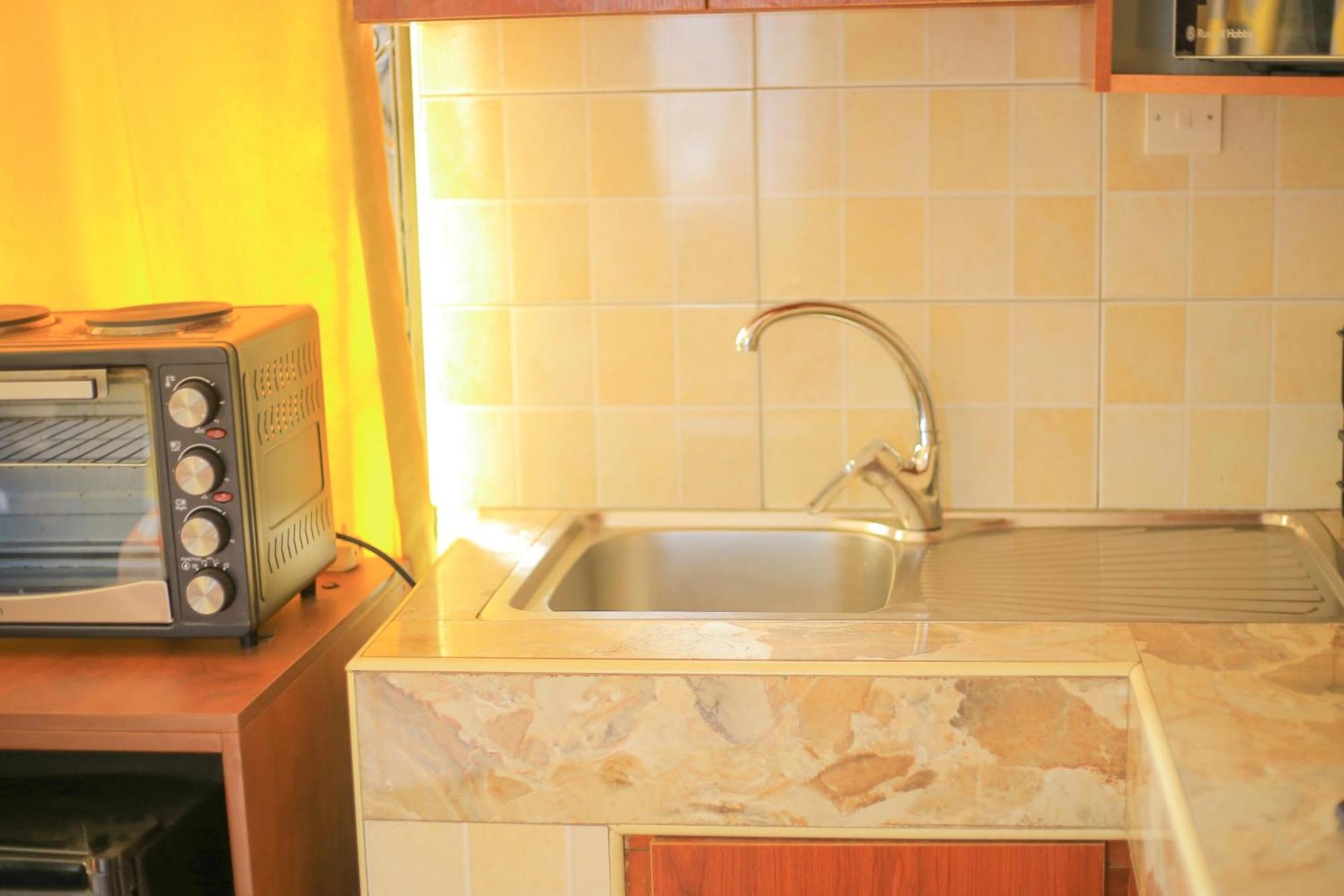Rustic Gardens Bed & Breakfast Kitunzi Lungujja Kampala Bagian luar foto